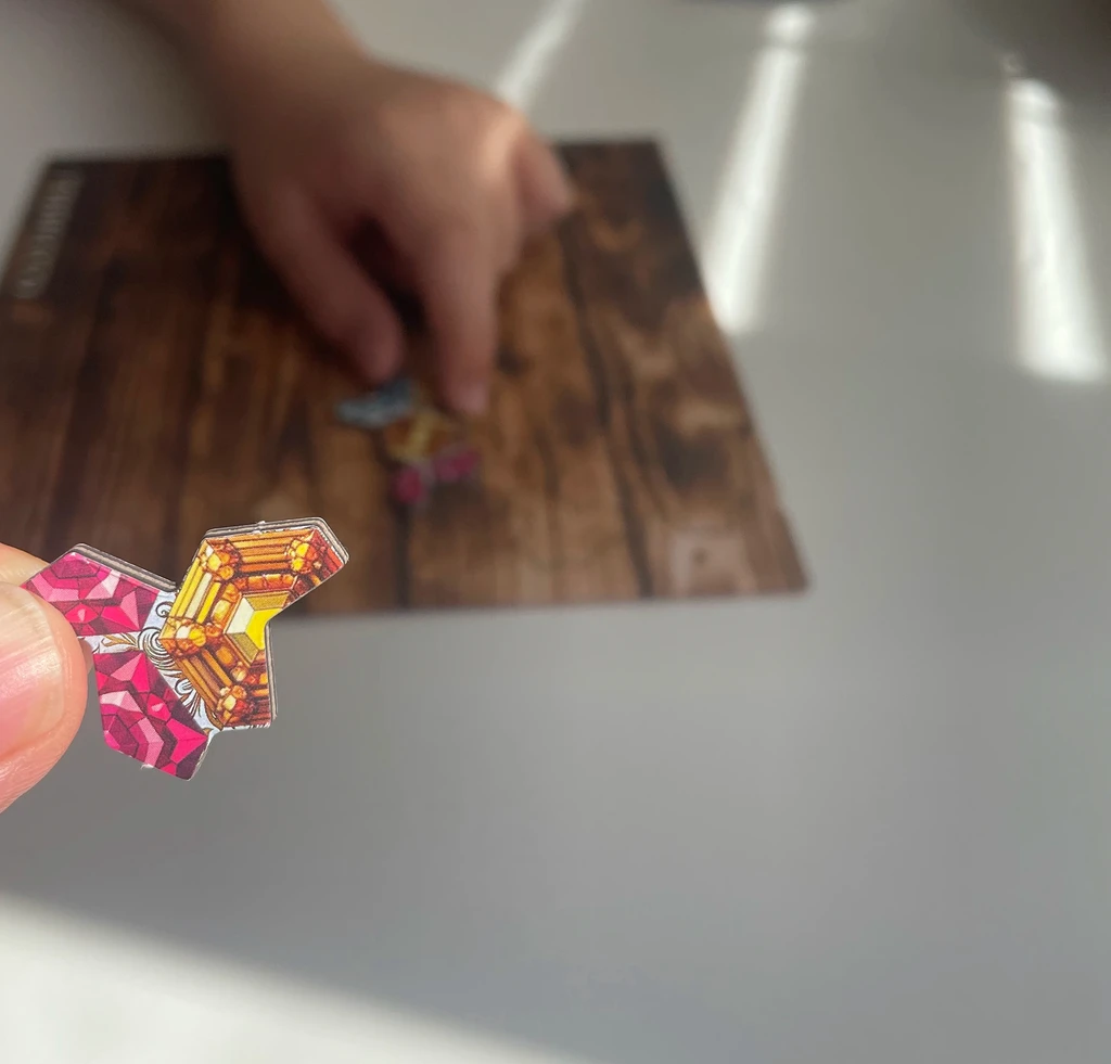 Tridecco game pieces and board