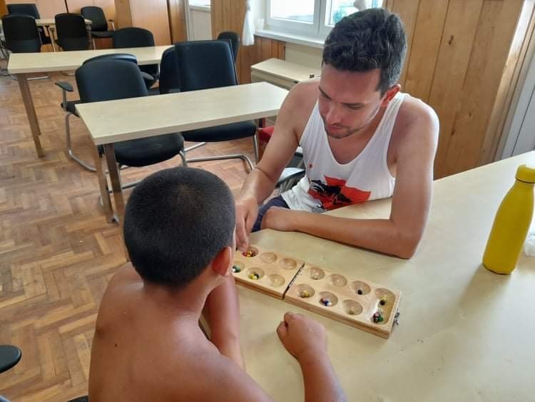 Collection of board game books including classic game references