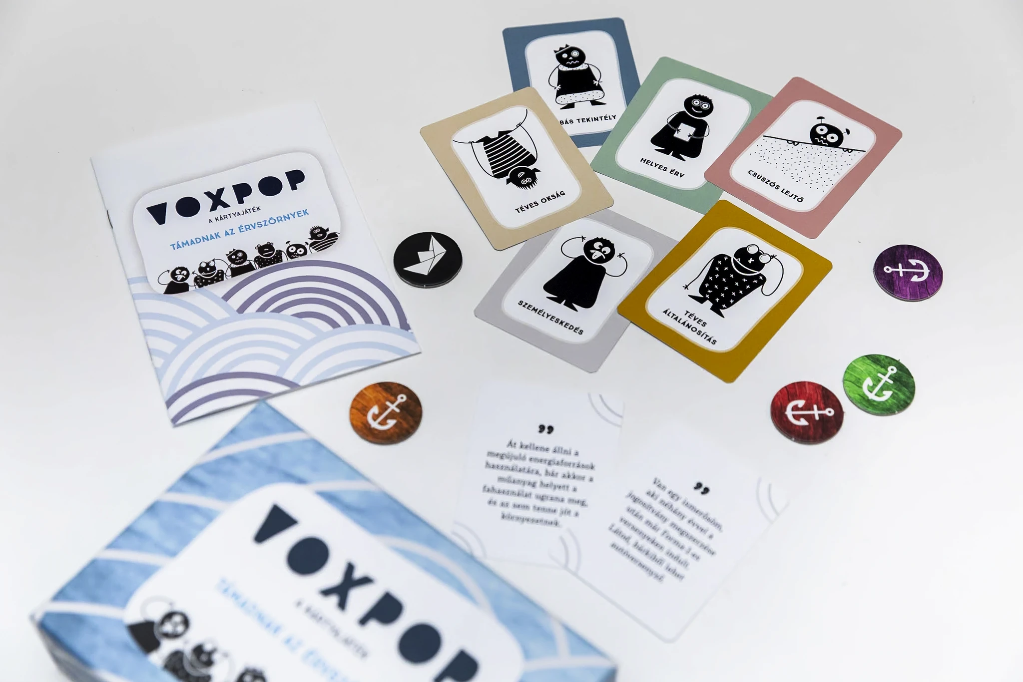 VoxPop card game components showing argument cards and game materials