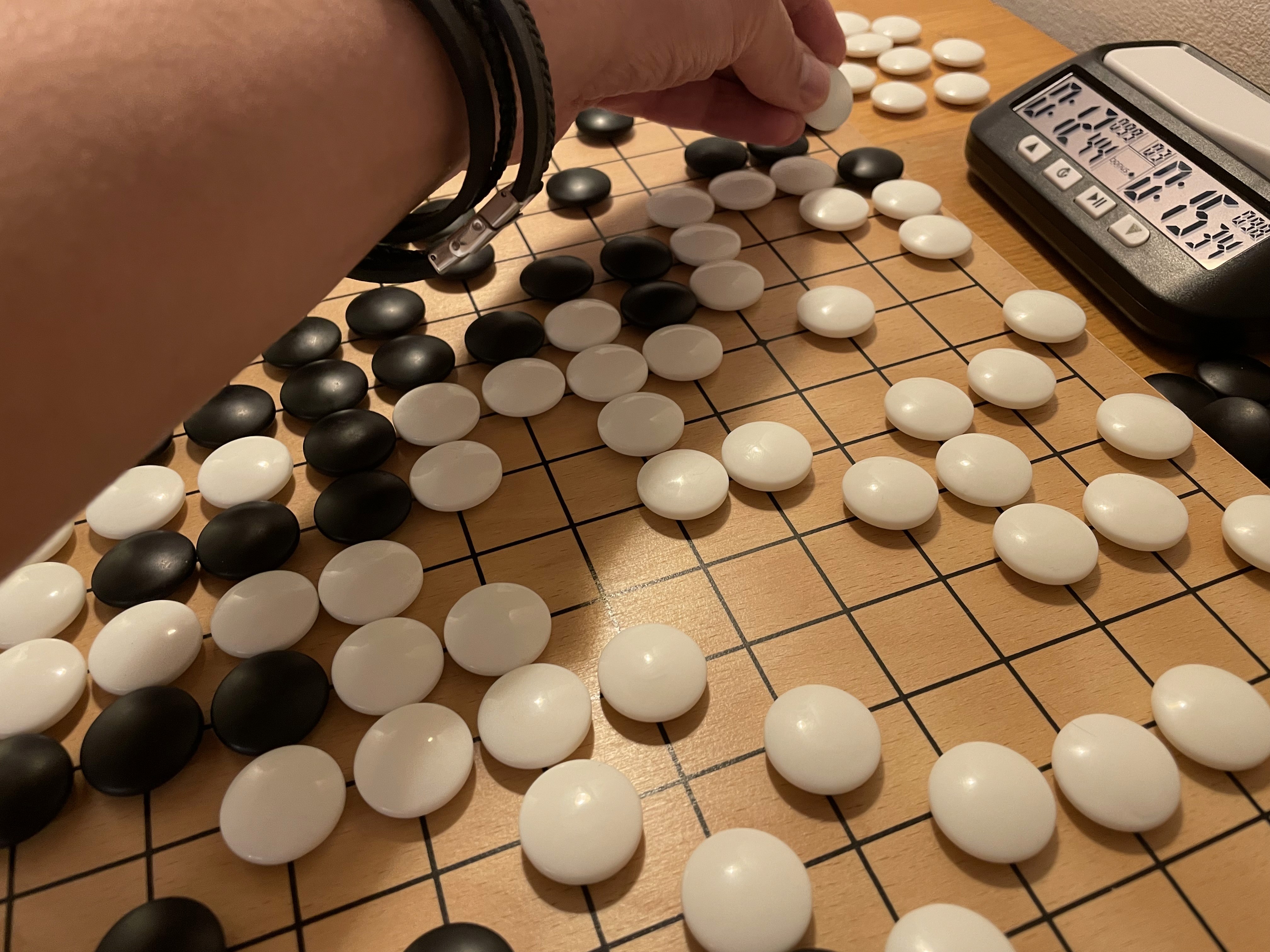 Máté from the PlayWise team playing Go